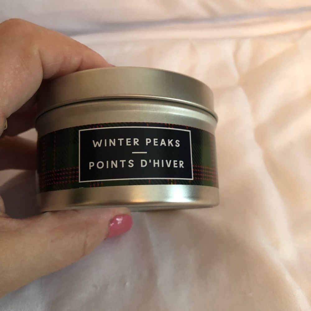 General supply candle in a tin